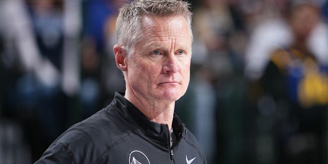Head Coach Steve Kerr of the Golden State Warriors looks on during the game against the Dallas Mavericks on March 22, 2023 at the American Airlines Center in Dallas, Texas.