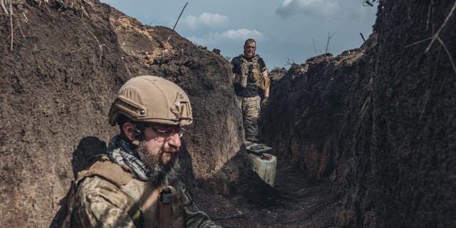 Ukrainian soldiers in a trench in the direction of Bakhmut, Ukraine, March 22, 2023.