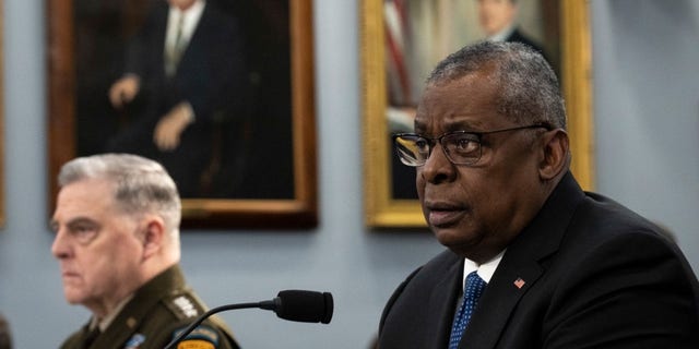 Chairman of the Joint Chiefs of Staff General Mark Milley, right, and Secretary of Defense Lloyd Austin testify during a House Appropriations Defense Subcommittee hearing on Capitol Hill March 23, 2023 in Washington, D.C.