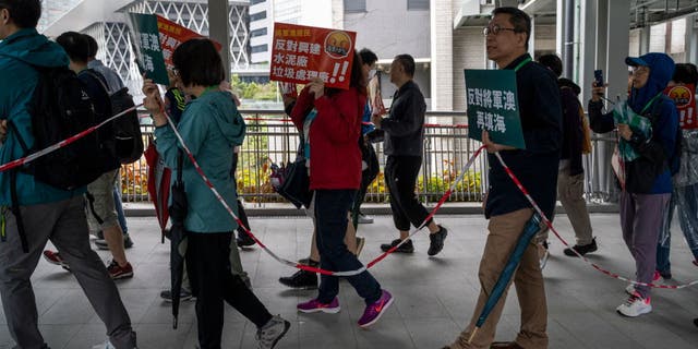 Protesters had to remain within police boundaries as they walked through Hong Kong.