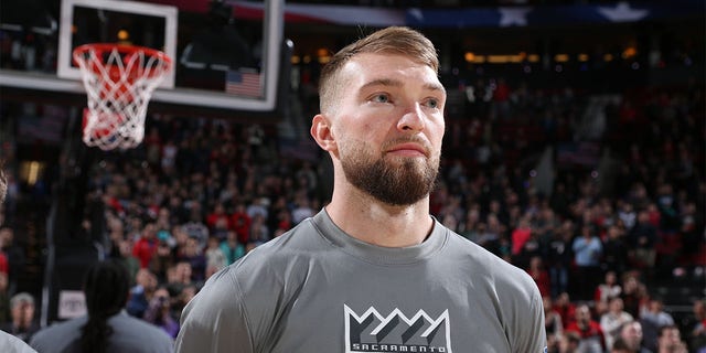 Domantas Sabonis of the Sacramento Kings performs the national anthem on March 29, 2023 at the Moda Center Arena in Portland, Oregon.
