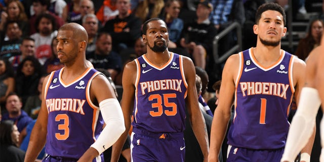 Kevin Durant, center, of the Suns during a Minnesota Timberwolves game on March 29, 2023 at the Footprint Center in Phoenix, Arizona.
