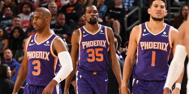 Kevin Durant, center, of the Suns during a Minnesota Timberwolves game on March 29, 2023 at the Footprint Center in Phoenix, Arizona.