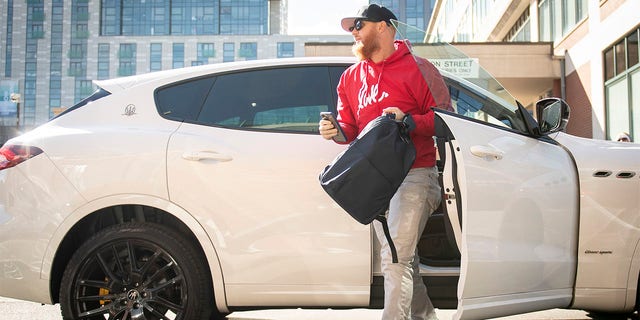 Justin Turner, #2 of the Boston Red Sox, arrives ahead of the Opening Day game against the Baltimore Orioles on March 30, 2023 at Fenway Park in Boston.