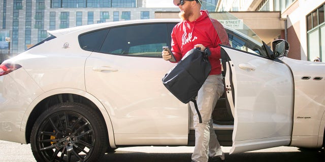 Justin Turner, #2 of the Boston Red Sox, arrives ahead of the Opening Day game against the Baltimore Orioles on March 30, 2023 at Fenway Park in Boston.