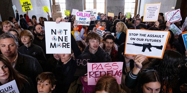 Protesters gather inside the Tennessee State Capitol to call for an end to gun violence and support stronger gun laws on March 30, 2023, in Nashville, Tennessee.