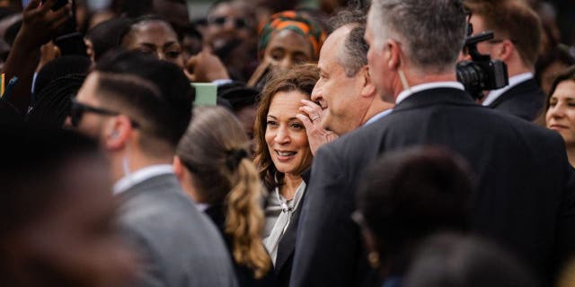 Vice President Kamala Harris and second gentleman Doug Emhoff arrive at Kenneth Kuanda International Airport in Lusaka, Zambia, on Friday.