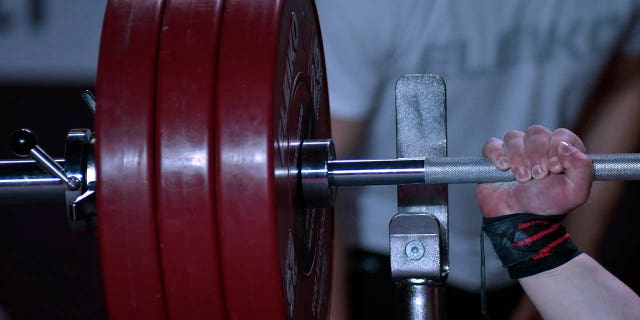 File - Detail as Ahmad Razm Azar of Georgia competes in the men's up to 80 kg category at the Para Powerlifting World Cup on March 07, 2021 in Bogota, Colombia.