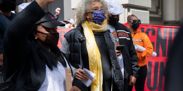 Social justice icon Angela Davis (center) at the May Day demonstrations along Market Street, Saturday, May 1, 2021, in San Francisco, Calif.