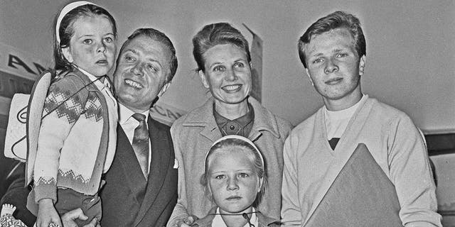 Attenborough family posing for photos at Heathrow airport in 1965