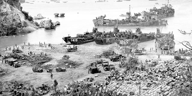 U.S. landing craft arrive on Okinawa 13 days into the American invasion, which began on April 1, 1945. 