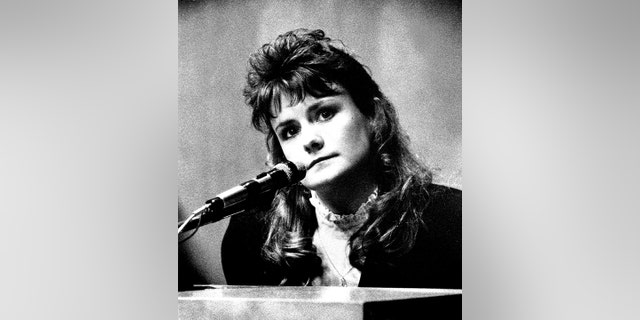 Pamela Smart listens to attorneys' question during her trial for killing her husband. The New Hampshire Supreme Court denied her attempt for a reduction of a life sentence. 