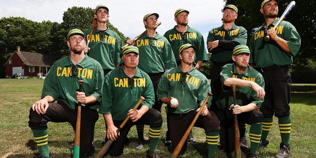 The Canton Cornshuckers pose for a photo during the 25th Annual Doc Adams Old Time Base Ball Festival at Old Bethpage Village Restoration on August 7, 2022, in Old Bethpage, New York. The event is named for important but largely forgotten baseball pioneer Daniel "Doc" Adams.