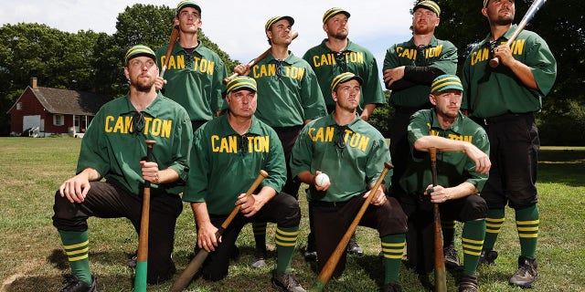 The Canton Cornshuckers pose for a photo during the 25th Annual Doc Adams Old Time Base Ball Festival at Old Bethpage Village Restoration on August 7, 2022, in Old Bethpage, New York. The event is named for important but largely forgotten baseball pioneer Daniel "Doc" Adams.