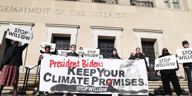 Climate activists hold a demonstration at the U.S. Department of the Interior on November 17, 2022, to urge President Biden to reject the Willow Project.