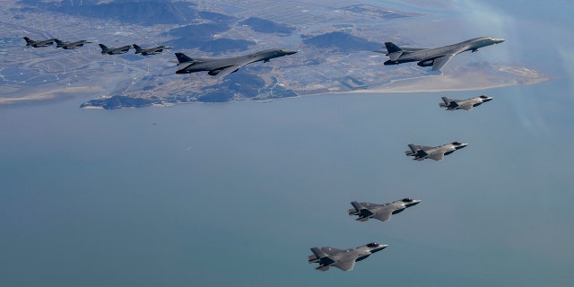 Two U.S. B-1B Lancer strategic bombers, four U.S. Air Force F-16 fighter jets and four South Korean Air Force F-35 fighter jets fly over South Korea on November 19, 2022. 