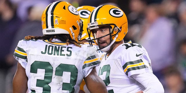 Aaron Rodgers of the Green Bay Packers celebrates with Aaron Jones during the Eagles game at Lincoln Financial Field on Nov. 27, 2022, in Philadelphia.