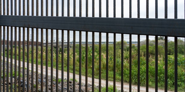 The Gateway International Bridge between Brownsville, Texas and Matamoros, Mexico, as seen through the border wall. Viewed from Texas side of the wall. 