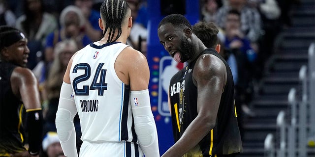 Draymond Green, #23 of the Golden State Warriors, taunts Dillon Brooks, #24 of the Memphis Grizzlies, during the fourth quarter at Chase Center on December 25, 2022 in San Francisco, California. 