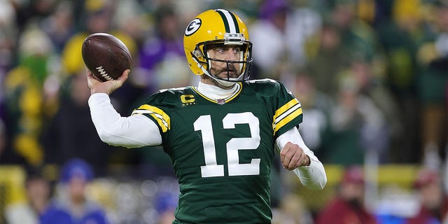 Aaron Rodgers of the Green Bay Packers looks to pass during a game against the Minnesota Vikings at Lambeau Field Jan. 1, 2023, in Green Bay, Wis. 