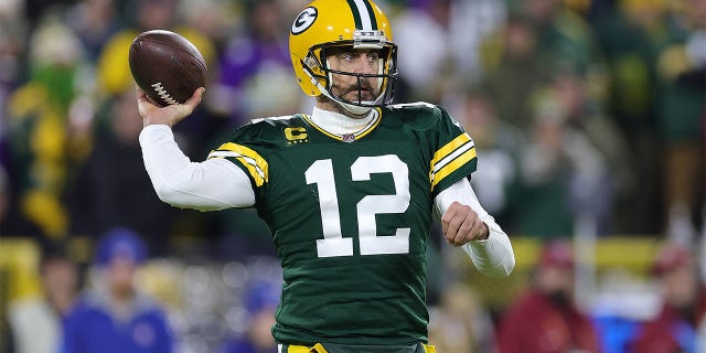 Aaron Rodgers of the Green Bay Packers looks to pass during a game against the Minnesota Vikings at Lambeau Field on January 1, 2023 in Green Bay, Wis.