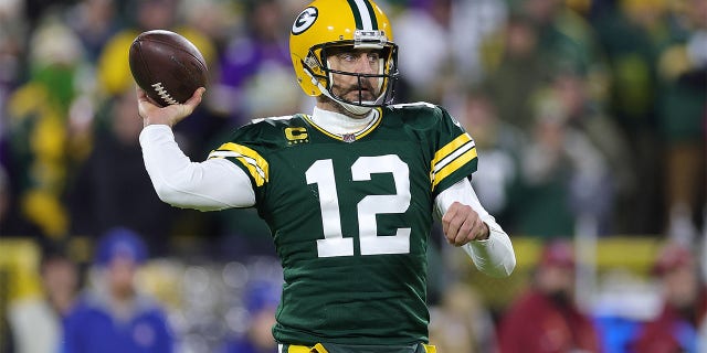 Aaron Rodgers of the Green Bay Packers looks to pass during a game against the Minnesota Vikings at Lambeau Field on January 1, 2023 in Green Bay, Wisconsin. 