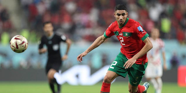 Achraf Hakimi of Morocco controls the ball during the FIFA World Cup Qatar 2022 third place match between Croatia and Morocco at Khalifa International Stadium on December 17, 2022 in Doha, Qatar. 