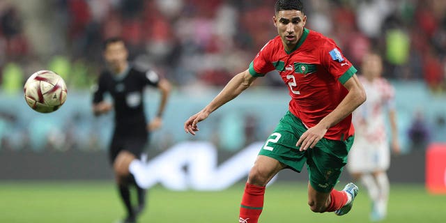 Achraf Hakimi of Morocco controls the ball during the FIFA World Cup Qatar 2022 third place match between Croatia and Morocco at Khalifa International Stadium on December 17, 2022 in Doha, Qatar. 