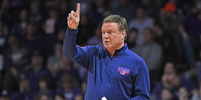 Head coach Bill Self of the Kansas Jayhawks instructs his players on the court in overtime against the Kansas State Wildcats at Bramlage Coliseum on January 17, 2023, in Manhattan, Kansas.  