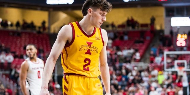 Guard Caleb Grill of the Iowa State Cyclones walks across the court during the Texas Tech Red Raiders game at United Supermarkets Arena on Jan. 30, 2023, in Lubbock, Texas.