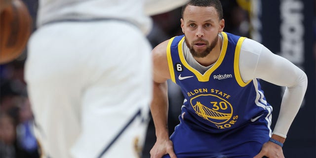 Stephen Curry of the Golden State Warriors plays the Denver Nuggets in the fourth quarter at Ball Arena Feb. 2, 2023, in Denver, Colo.