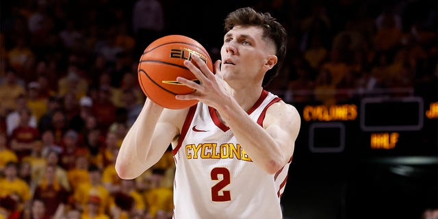 Caleb Grill of the Iowa State Cyclones shoots against the Kansas Jayhawks at the Hilton Coliseum on February 4, 2023 in Ames, Iowa.