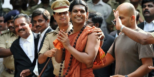 Politicians, cities forging ties with fake Hindu cult leader reveals pitfalls of 'inclusivity': Buck Sexton 2 Police escort controversial Hindu Godman Swami Nityananda