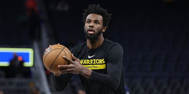 Andrew Wiggins of the Golden State Warriors warms up before a game against the Washington Wizards at the Chase Center on February 13, 2023 in San Francisco. 