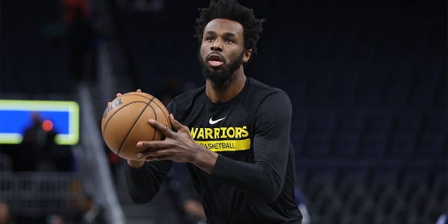 Andrew Wiggins of the Golden State Warriors warms up before a game against the Washington Wizards at the Chase Center on February 13, 2023 in San Francisco. 