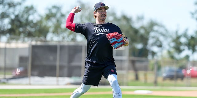 Kenta Maeda, #18 of the Minnesota Twins, throws during a team workout on Feb. 18, 2023 at the Hammond Stadium in Fort Myers, Florida. 