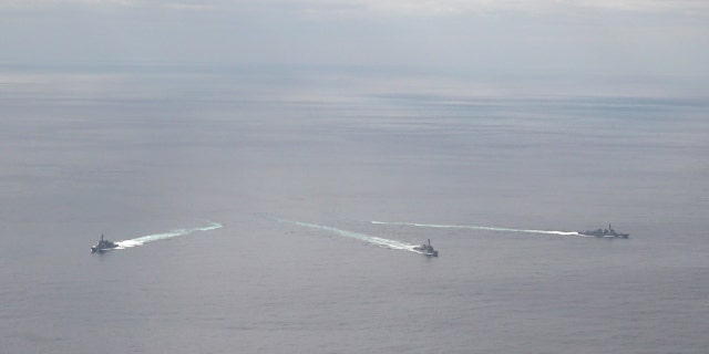 In this handout image released by the South Korean Defense Ministry, South's Sejong the Great, the U.S.'s USS Barry and the Japan Maritime Self-Defense Force's JS Atago are seen during a combined naval exercise on February 22, 2023.