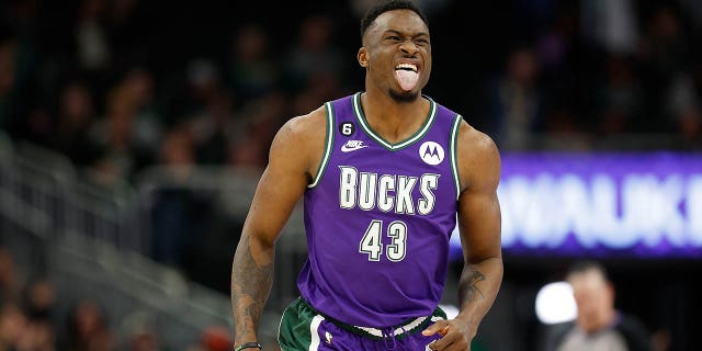 Thanasis Antetokounmpo, #43 of the Milwaukee Bucks, reacts after scoring during the second half of a game against the Miami Heat at Fiserv Forum on February 24, 2023 in Milwaukee.