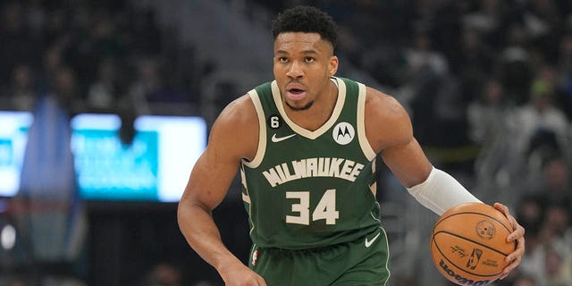 Giannis Antetokounmpo of the Milwaukee Bucks dribbles the ball in the first half of a game against the Philadelphia 76ers at the Fiserv Forum on March 4, 2023 in Milwaukee. 