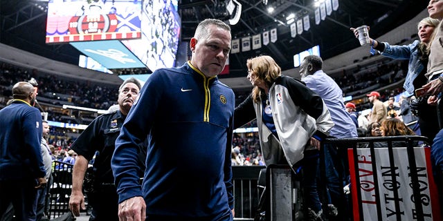 Nuggets head coach Michael Malone exits the arena floor after losing to the Chicago Bulls 117-96 win at Ball Arena in Denver on March 8, 2023.