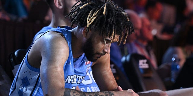 RJ Davis, #4 of the North Carolina Tar Heels, waits to be introduced before a game against the Virginia Cavaliers in the quarterfinals of the ACC Basketball Tournament at the Greensboro Coliseum on March 9, 2023 in Greensboro, North Carolina.