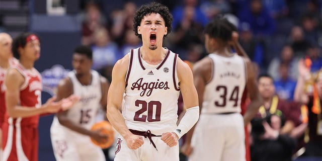 Andre Gordon #20 of the Texas A&M Aggies celebrates against the Arkansas Razorbacks during the quarterfinals of the 2023 SEC Basketball Tournament on March 10, 2023 in Nashville, Tennessee. 