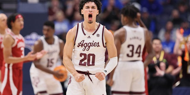 Andre Gordon #20 of the Texas A&M Aggies celebrates against the Arkansas Razorbacks during the quarterfinals of the 2023 SEC Basketball Tournament on March 10, 2023, in Nashville, Tennessee.