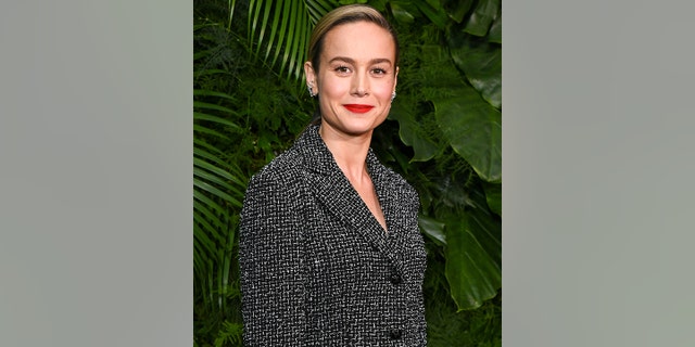 Brie Larson wore a gorgeous Chanel jacket, adorned with little black buttons with the signature CC on them.