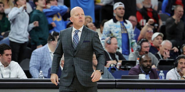 UCLA Bruins head coach Mick Cronin reacts after a dunk by Amari Bailey, #5, against the Arizona Wildcats was discounted for an offensive foul in the first half of the championship game of the Pac-12 basketball tournament at T-Mobile Arena on March 11, 2023 in Las Vegas. The Wildcats defeated the Bruins 61-59.