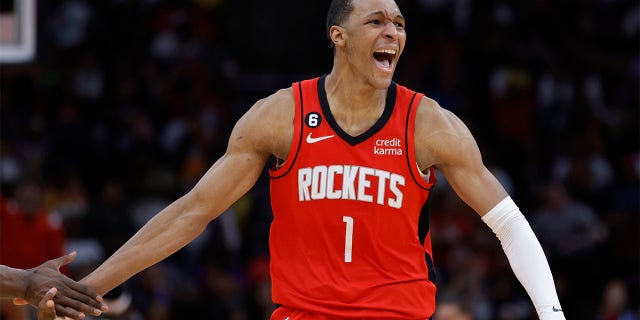 Jabari Smith Jr., #1 of the Houston Rockets, reacts to a three point basket against the Los Angeles Lakers during the second half at Toyota Center on March 15, 2023 in Houston.
