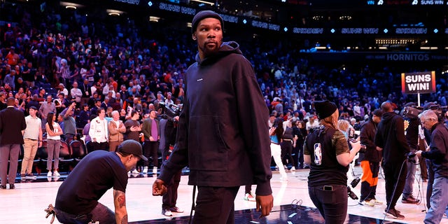 Kevin Durant of the Suns leaves the court after the Suns beat the Orlando Magic 116-113 at the Footprint Center on March 16, 2023 in Phoenix, Arizona.