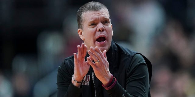 Head coach Tobin Anderson applauds the Fairleigh Dickinson Knights during the NCAA Men's Basketball Tournament at Nationwide Arena on March 17, 2023, in Columbus, Ohio.