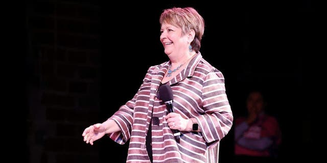 Judge Janet Protasevich on stage during the live recording of the "pod saving america," Hosted by WisDems at the Barrymore Theater on March 18, 2023 in Madison, Wisconsin.