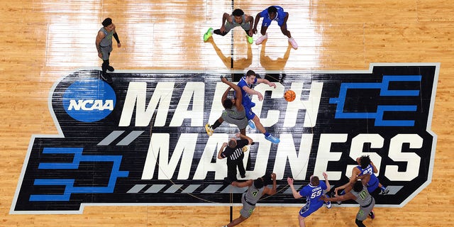 Ryan Kalkbrenner, #11 of the Creighton Bluejays, wins the opening tip over Flo Thamba #0 of the Baylor Bears in the second round of the 2023 NCAA Men's Basketball Tournament at Ball Arena on March 19 in Denver, Colorado. 